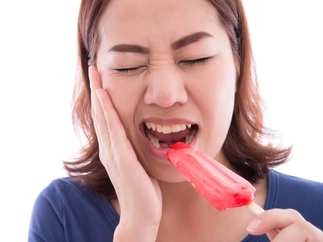 what causes sensitive teeth