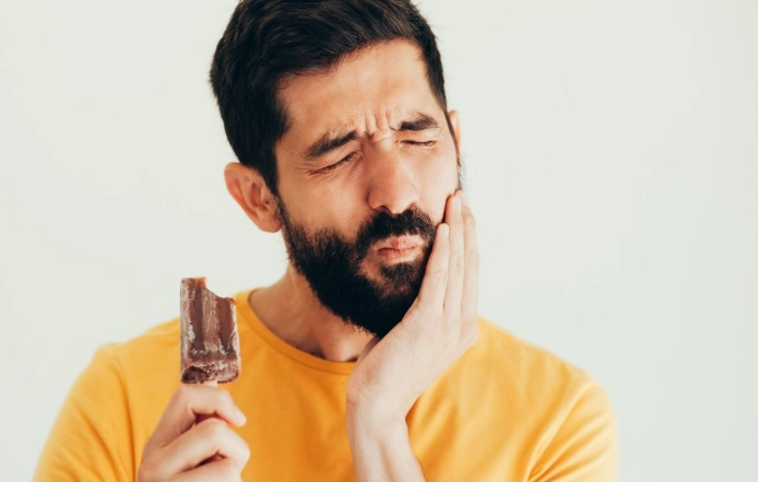 Sensitive Teeth Treatment: Expert Guide to Pain Relief & Prevention